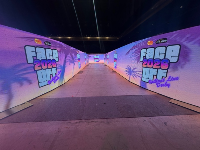 An 11m LED catwalk video wall showing Face Off 2026 graphics on both sides of the darts walk-on at Vaillant Live, Derby