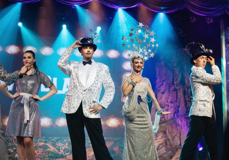 Example image: a pageant-style stage with an LED backdrop