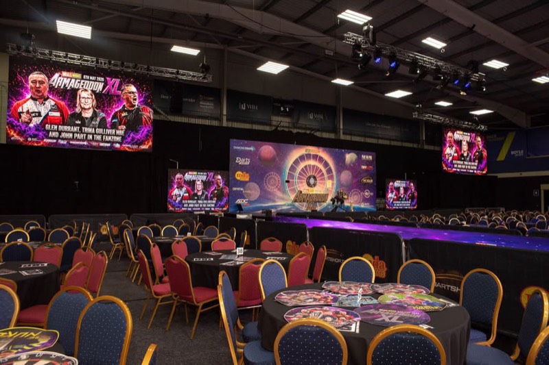 Function room with curved LED walls ready for a speaker evening