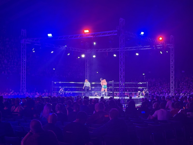 Spotlit ring in a darkened arena
